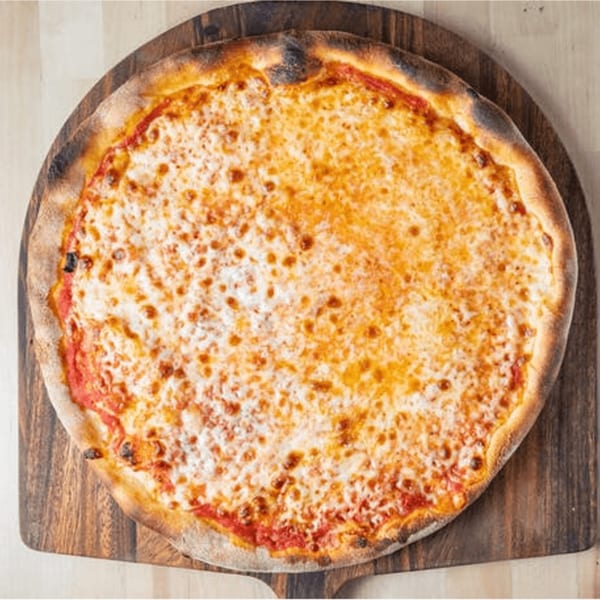 A whole, cheesy Pazza Pizza Margherita on a wooden pizza peel, ready to be served.